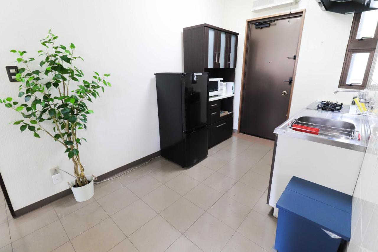 Condominium Hotel Mihama Upi Chatan Phòng bức ảnh