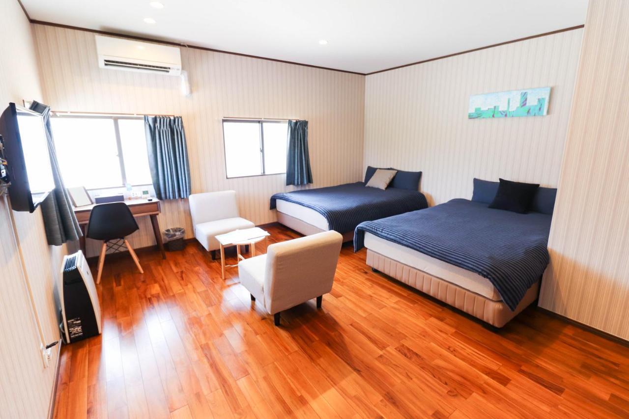 Condominium Hotel Mihama Upi Chatan Phòng bức ảnh