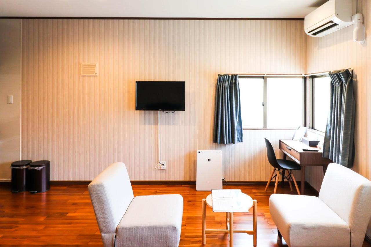 Condominium Hotel Mihama Upi Chatan Phòng bức ảnh